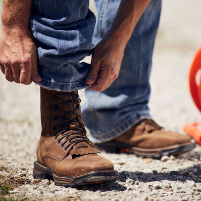 Worker wearing Durango Maverick XP lacer waterproof work boots