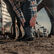 Woman wearing Durango Shyloh western boots by a horse trailer