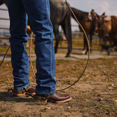 Cowboy wearing PRCA Collection DDB0466 western boot