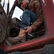 Man in a truck wearing Rebel™ Durango western boots 